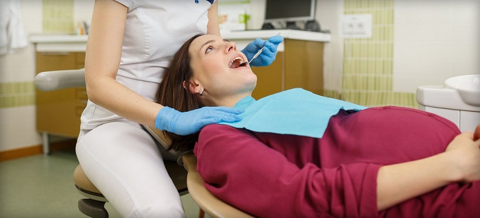 مراجعه به دندانپزشکی در بارداری، بهترین و کم خطرترین زمان