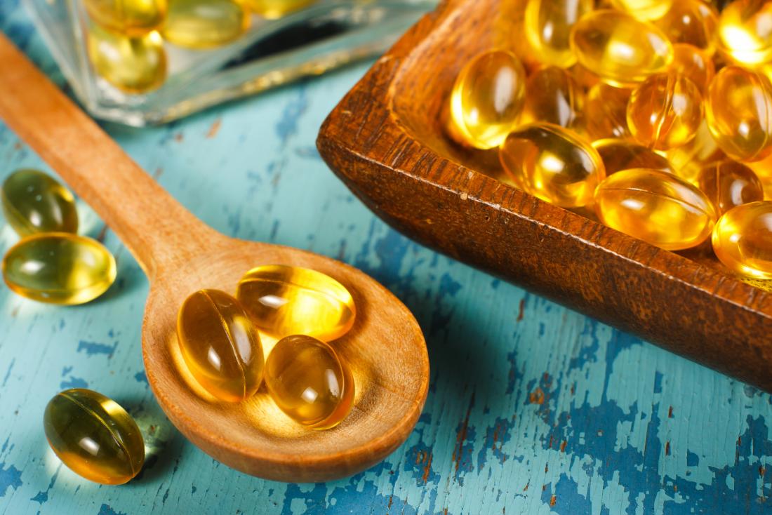 fish-oil-supplements-on-blue-background