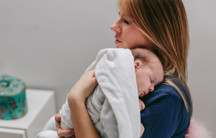 mother_hugging_her_sleeping_baby_girl_2022_02_01_22_38_52_utc_jpg