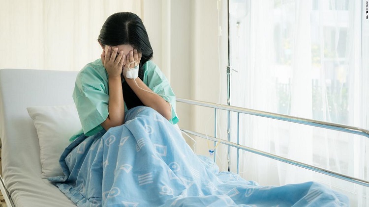 201007160949-woman-crying-hospital-stock-super-tease