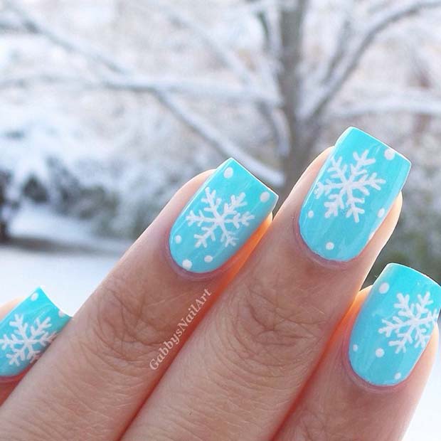 Light-Blue-Snow-and-Snowflake-Nails