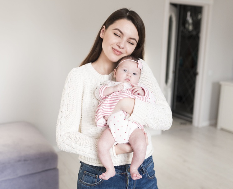 loving-mother-with-baby-hands-scaled-e17079037566571