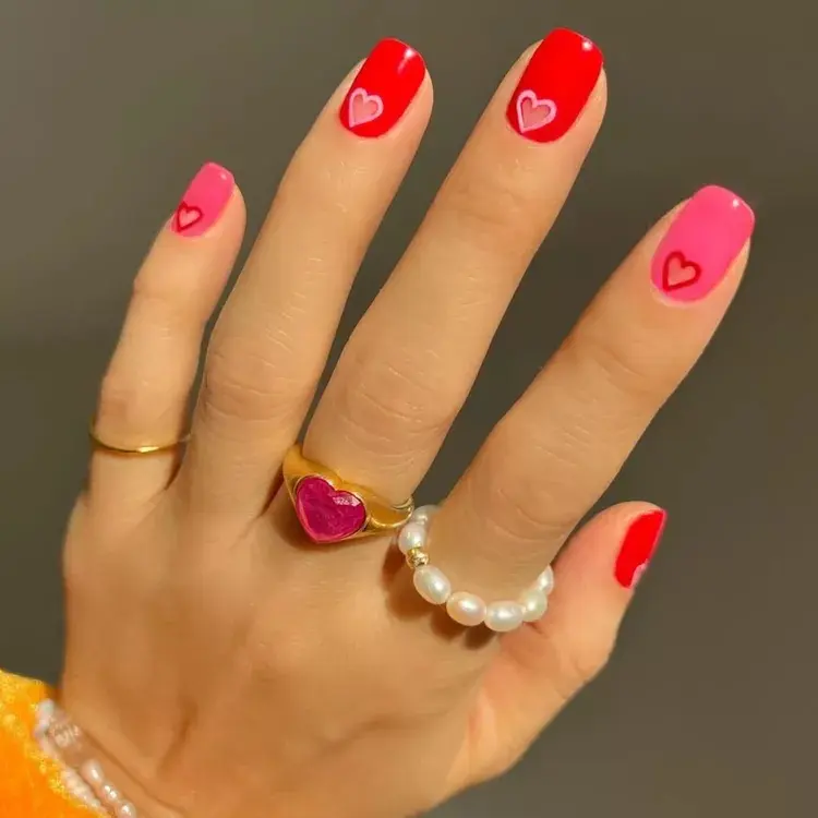 Pink-and-Red-Cutout-Heart-Nails-InStyle-Heart-Nail-Ideas-ee5dd6e22870465fa162dfeb642354e2