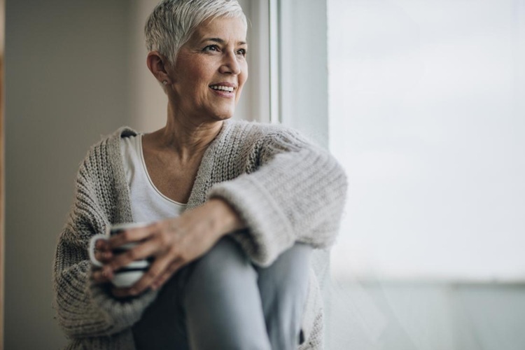 senior-woman-looking-out-the-window1