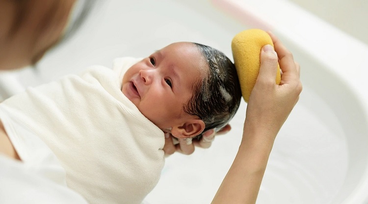 baby_first_bath-hero-shutterstock_2265229441