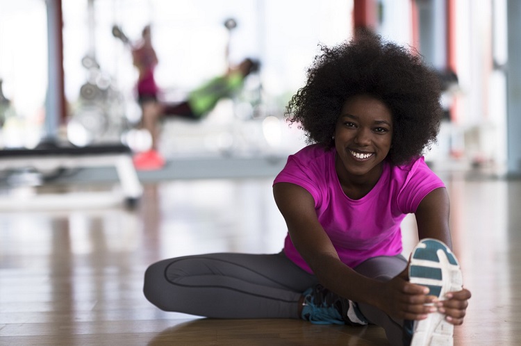 Woman stretching hamstrings1