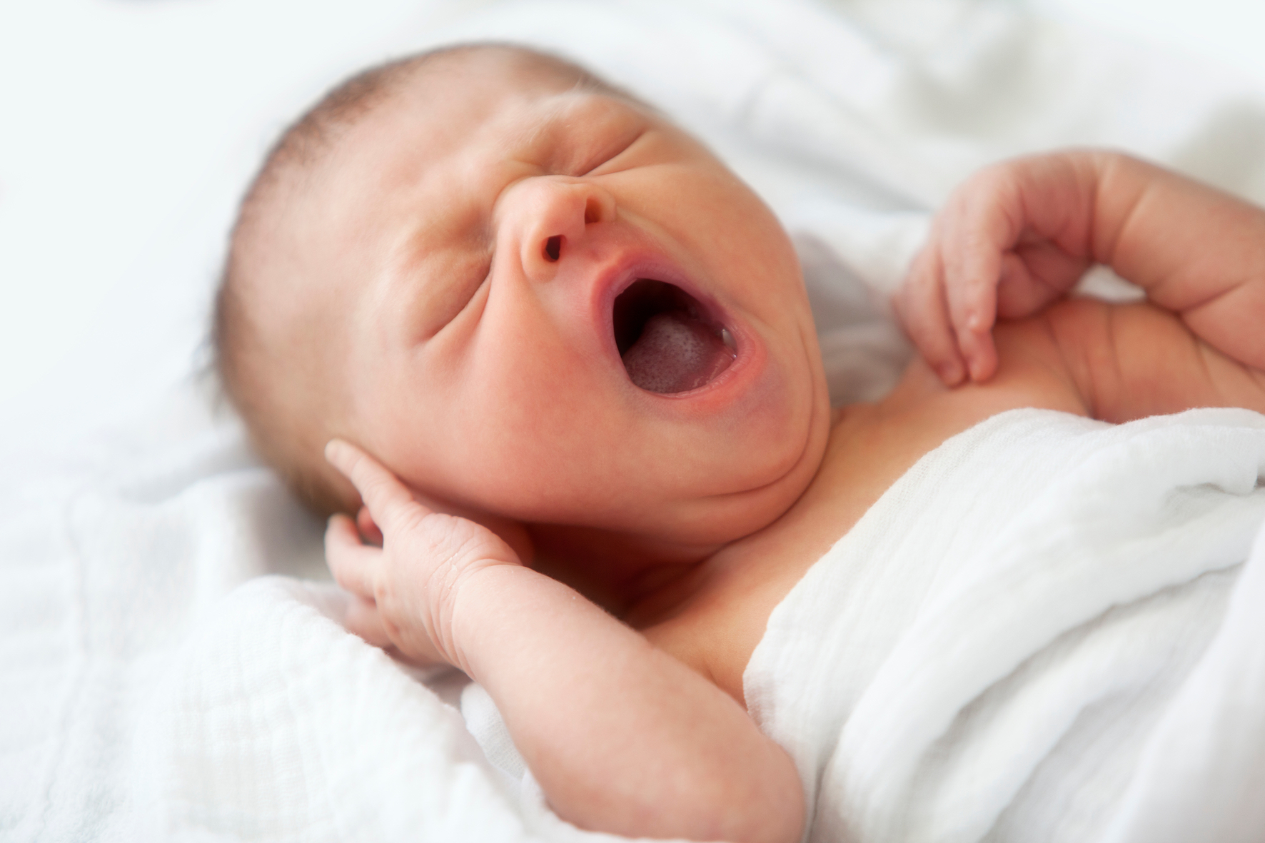 bigstock-Yawning-newborn-baby-infant-is-231458386