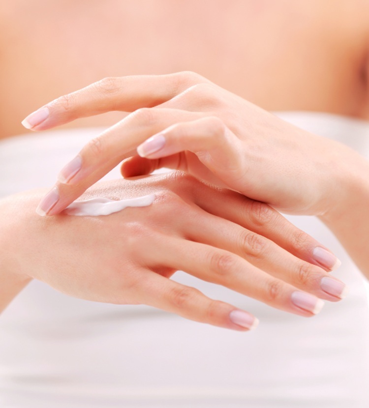 Woman-practising-her-hand-care-routine