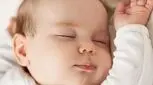 خنده نوزاد در خواب، علت و انواع