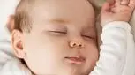 خنده نوزاد در خواب، علت و انواع
