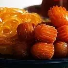 طرز تهیه زولبیا بامیه خانگی؛ دستور بازاری با شربت شفاف و تردی ماندگار
