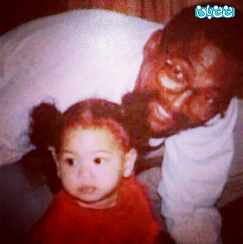 عکس بیانسه خواننده آمریکایی، همراه پدرش در کودکی