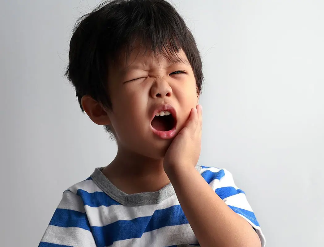 علت آبسه دندان های شیری  و درمان آن